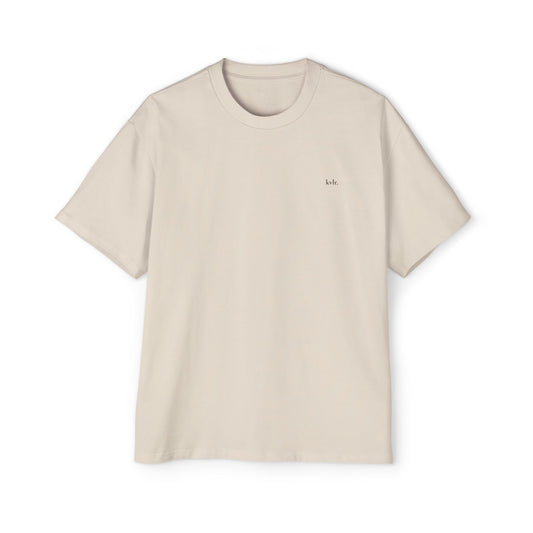 Back graphic detail: halftone eye framed by olive branches with STILL HERE — The Observer tee KVLR Collective Drop 001