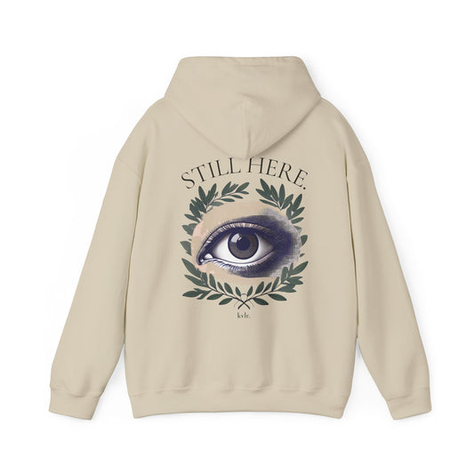 KVLR Collective The Observer hoodie in sand colorway, halftone eye and olive branch back print with STILL HERE text — Drop 001 unisex oversized streetwear